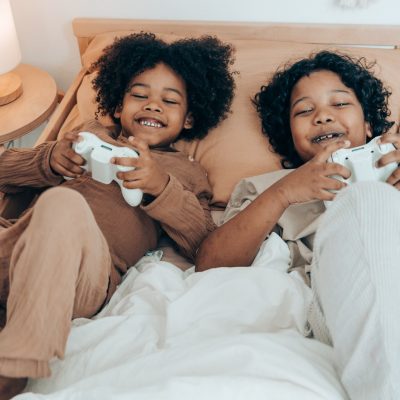 kids smiling playing video games
